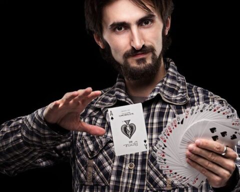 magician completing a card trick