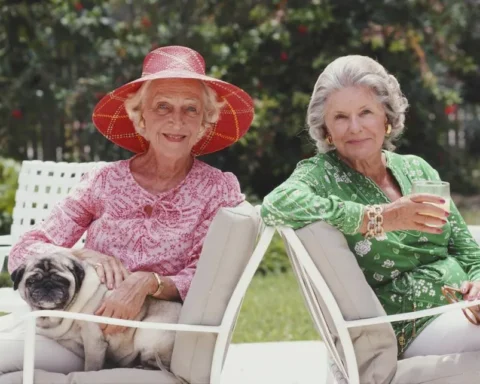 Two women sitting outside