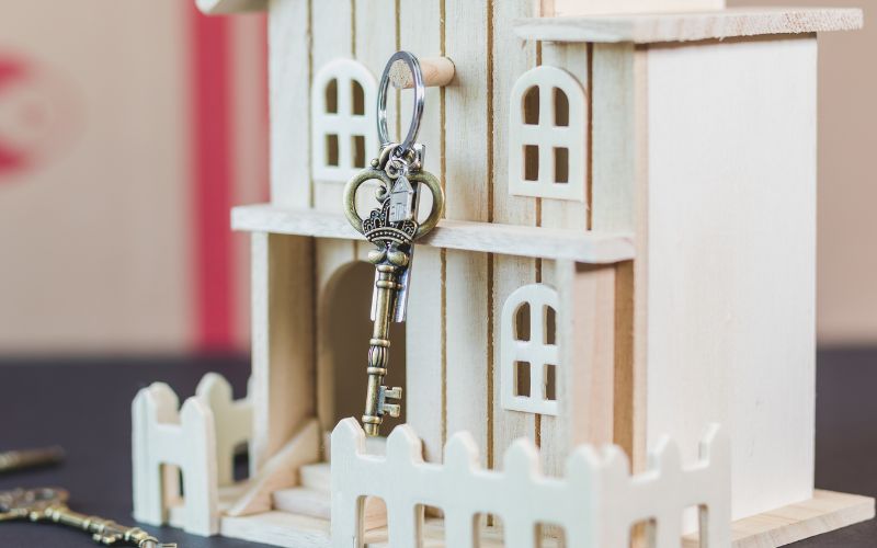 doll house with a key attached