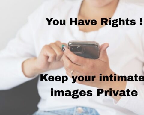 feminine looking hand holding a cell phone