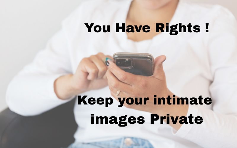 feminine looking hand holding a cell phone